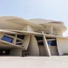 Tourists exploring modern and traditional award-winning architecture in Doha, Qatar with a specialized guide.