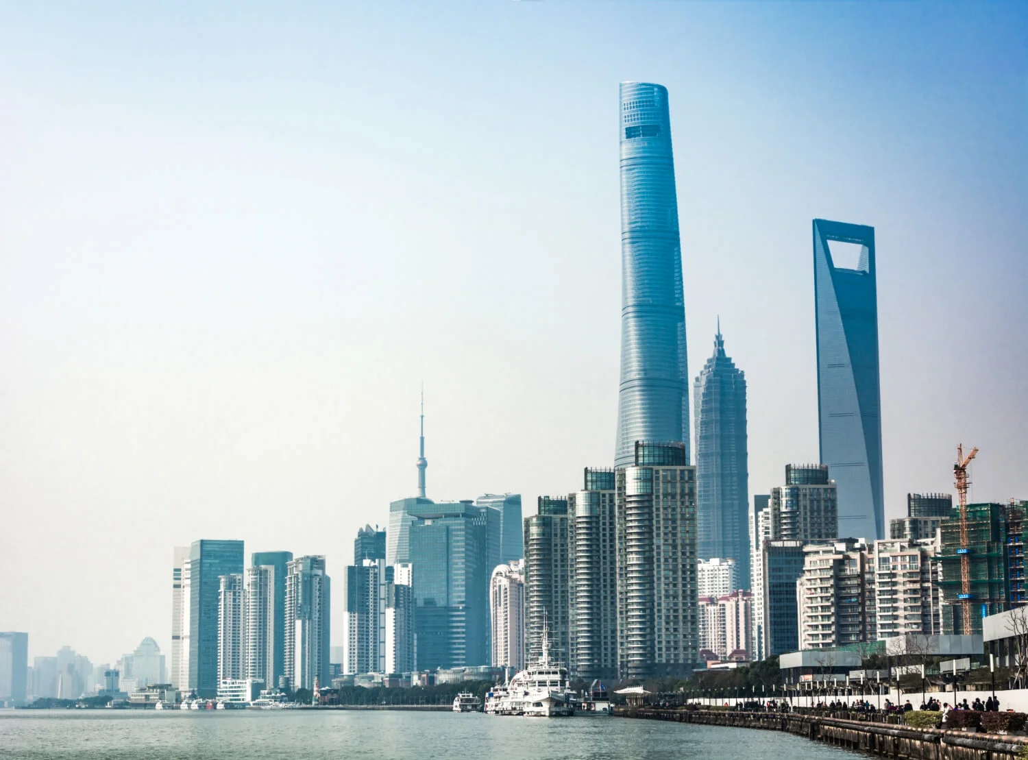 Skyline of Doha with Souq Waqif, Museum of Islamic Art, Corniche, and The Pearl-Qatar among the city’s top attractions.