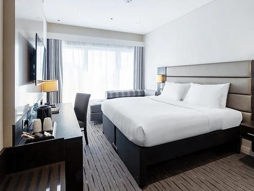 Premier Inn Doha Airport Hotel exterior with modern design and easy access to Hamad International Airport.