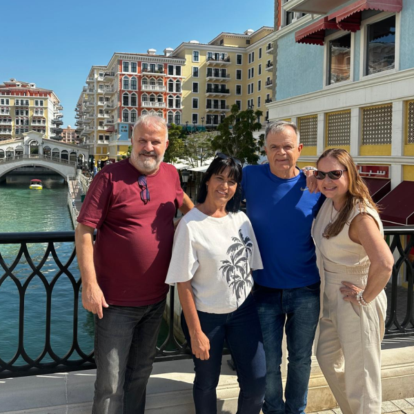 Happy travellers enjoying sightseeing at famous tourist destinations