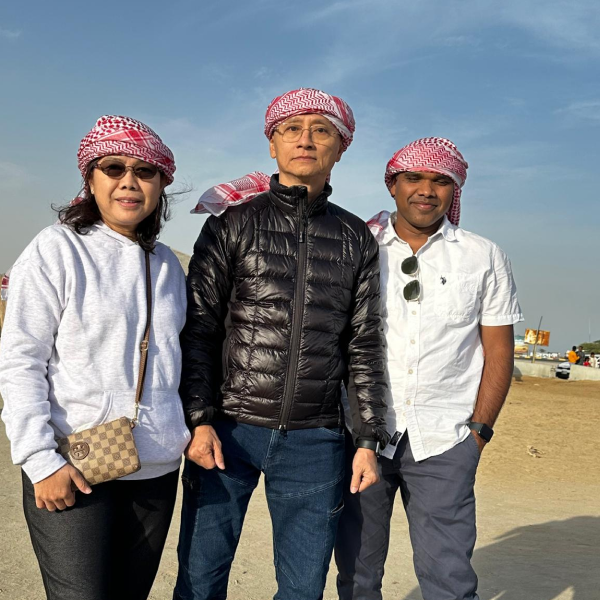 Travellers experiencing a thrilling desert safari across golden dunes