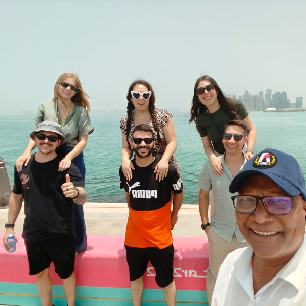 Happy travellers enjoying a sunny day at the beach