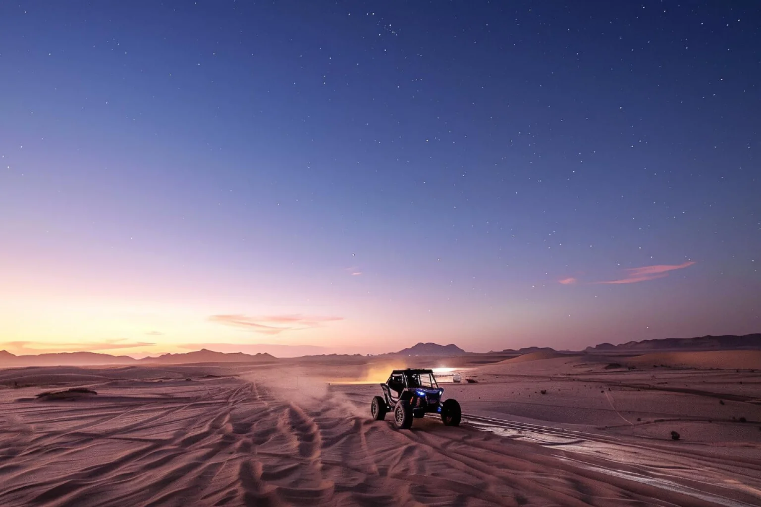 Overnight desert safari in UAE with dune buggy adventure under a starlit sky.